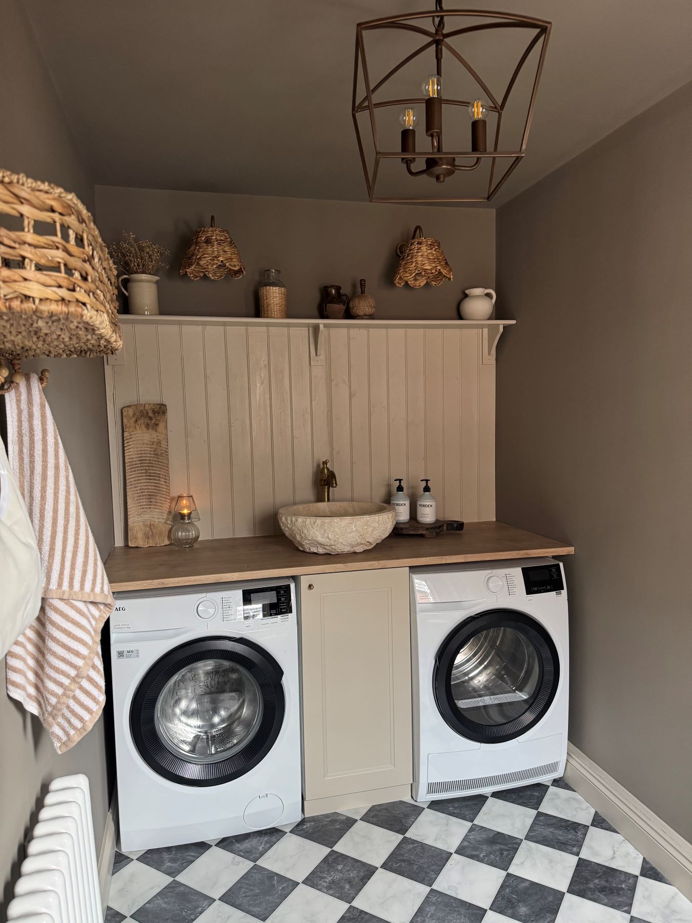 traditional utility room with black and white checkerboard floor